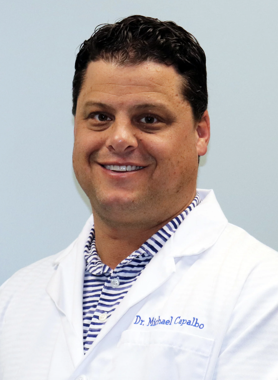 Michael Capalbo, DMD | Wickford Dental Group Logo