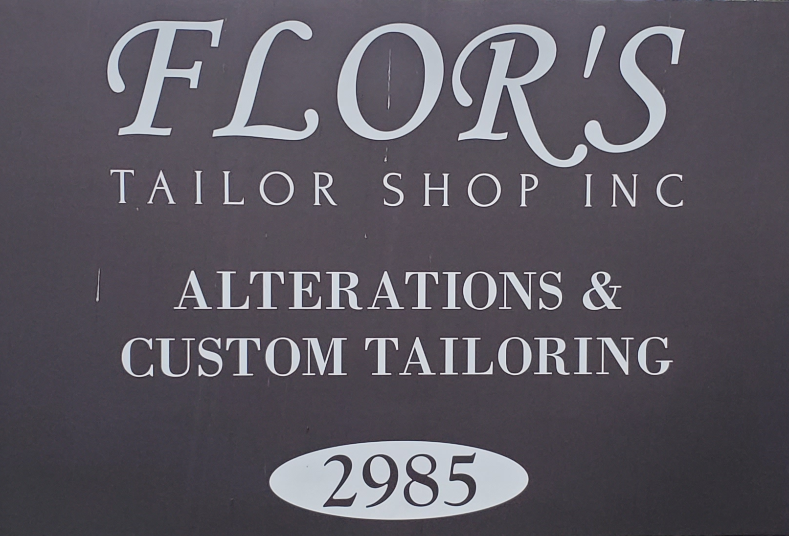 Flor's Tailor Shop Logo