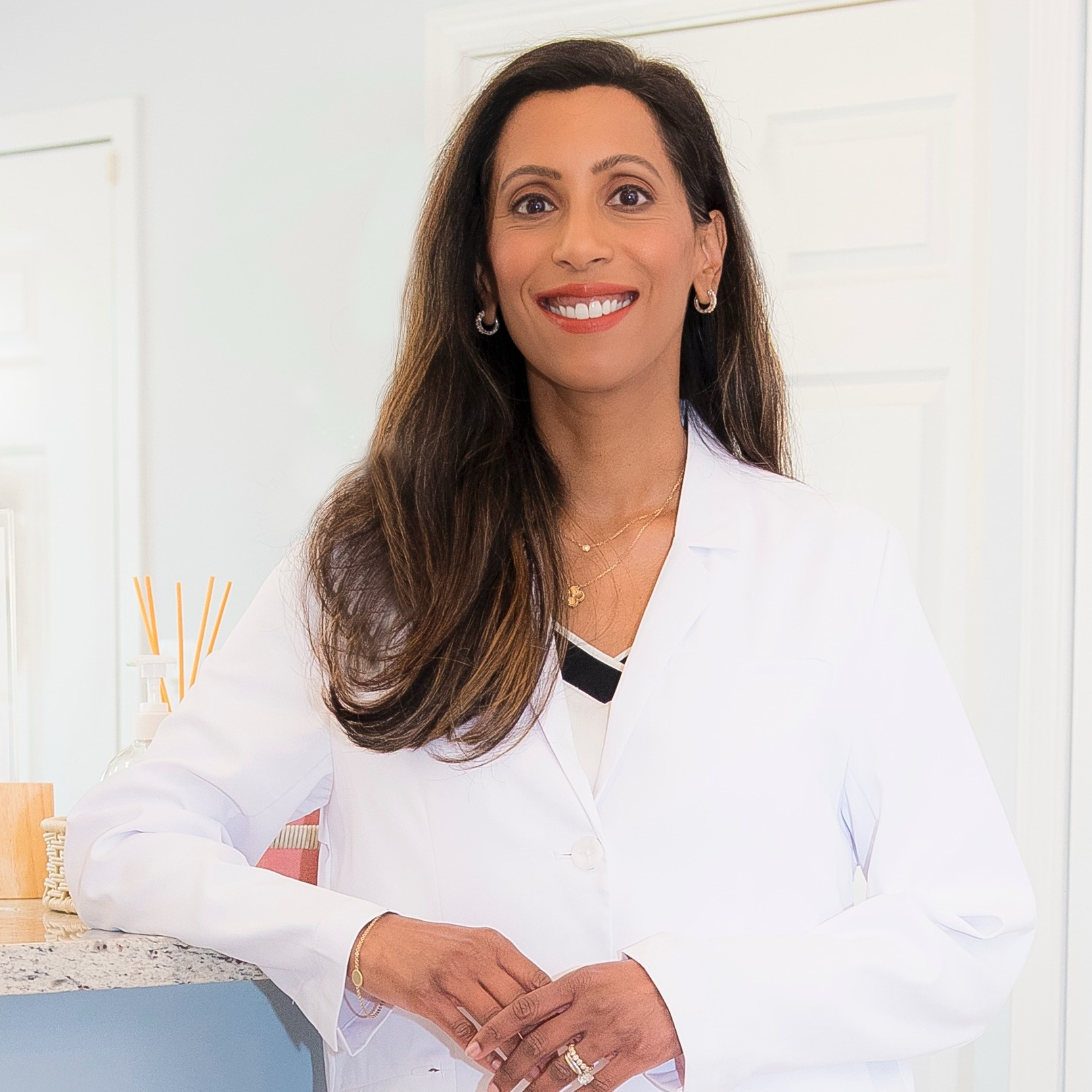 Archana M. Johnson, DDS, PC Logo