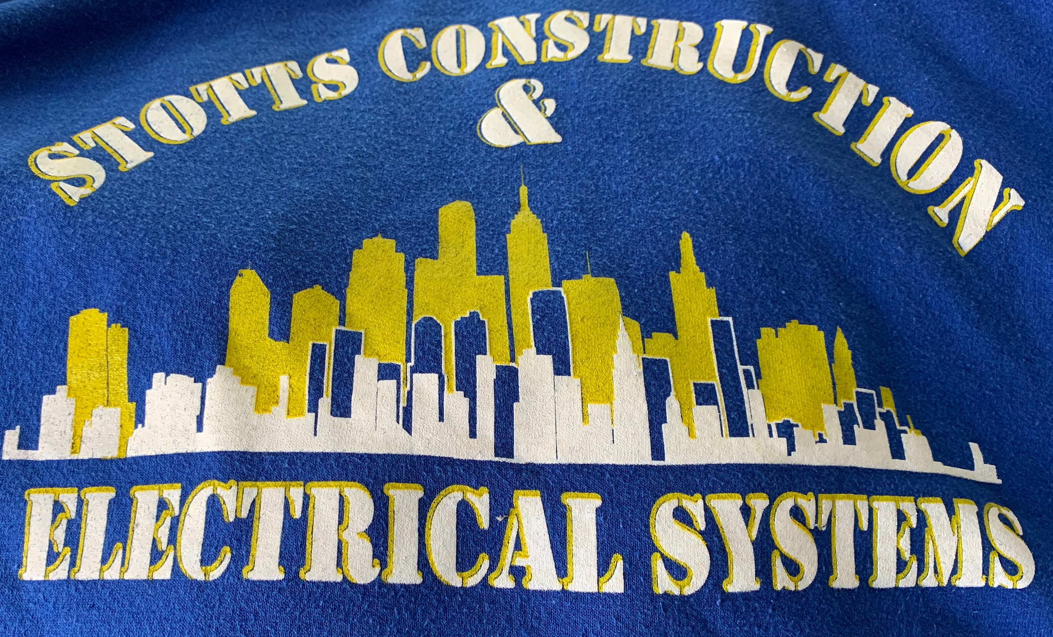 Stott Construction and Electrical Systems Inc. Logo
